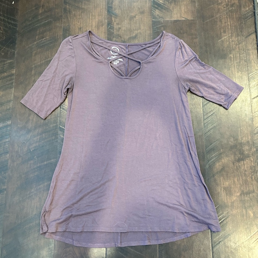 Purple blouse with criss-crossed details